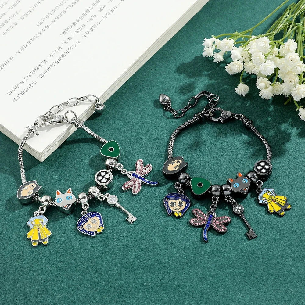 Coraline and the Secret Door Charm Bracelets - The Pink Controller 