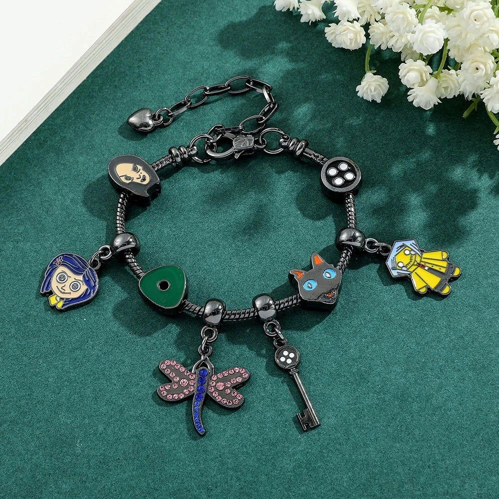 Coraline and the Secret Door Charm Bracelets - The Pink Controller 