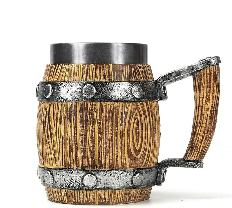 Wooden mug with metal band and handle on a white background